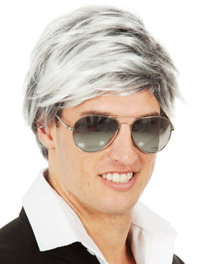 Image of man wearing black aviators and short grey wig.
