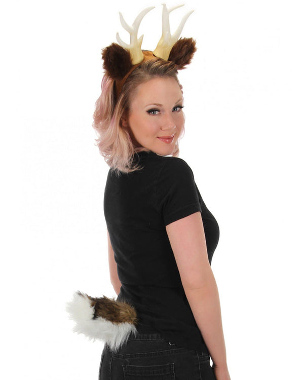 Image of woman wearing deer headband and perky deer tail. 